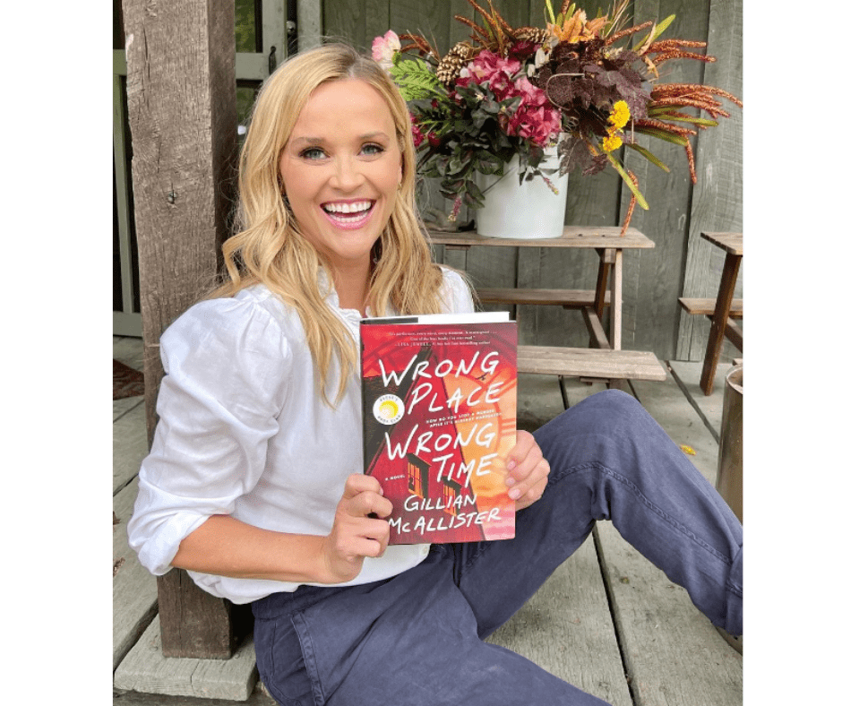 Reese Witherspoon with her August bookclub pick, Wrong Place Wrong Time by Gillian McAllister 
