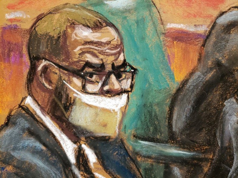 FILE PHOTO: R. Kelly sits with his lawyers during Kelly's sex abuse trial at Brooklyn's Federal District Court in a courtroom sketch in New York, U.S., September 17, 2021. REUTERS/Jane Rosenberg