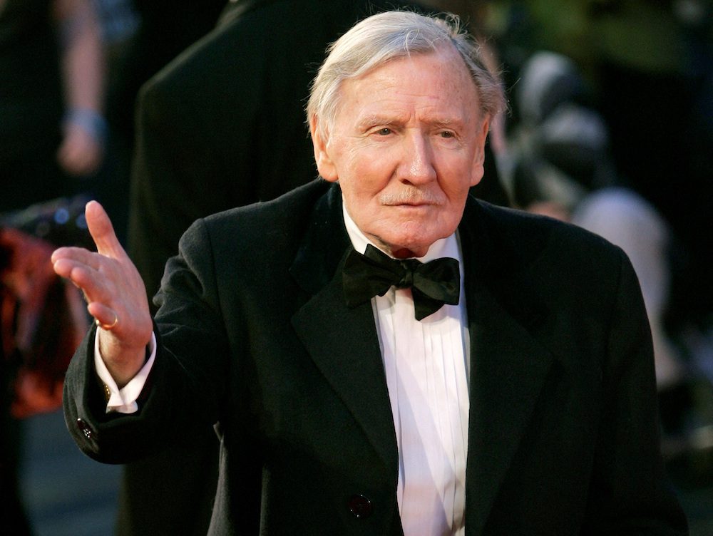 FILE PHOTO: Leslie Phillips arrives for the BAFTA (British Academy of Film and Television Arts) awards at The Royal Opera House in London February 11, 2007. REUTERS/Stephen Hird/File Photo
