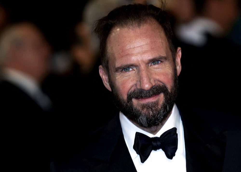FILE PHOTO: Ralph Fiennes poses for photographers on the red carpet at the world premiere of the new James Bond 007 film "Spectre" at the Royal Albert Hall in London, Britain, October 26, 2015. REUTERS/Luke MacGregor/File Photo