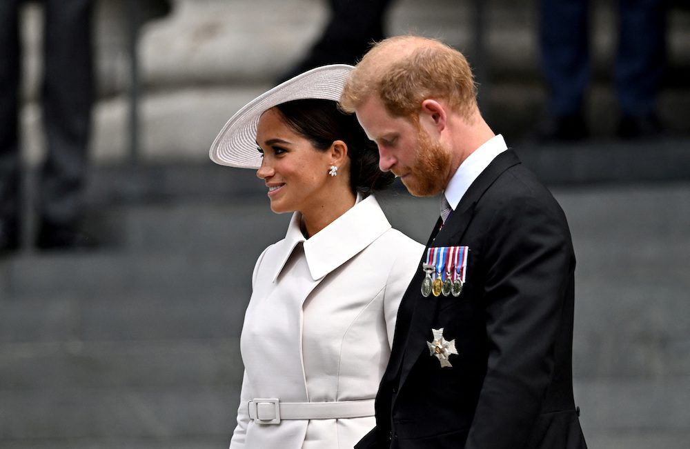 FILE PHOTO: Britain's Prince Harry and his wife Meghan, Duchess of Sussex, leave after the National Service of Thanksgiving held at St Paul's Cathedral as part of celebrations marking the Platinum Jubilee of Britain's Queen Elizabeth, in London, Britain, June 3, 2022. REUTERS/Dylan Martinez