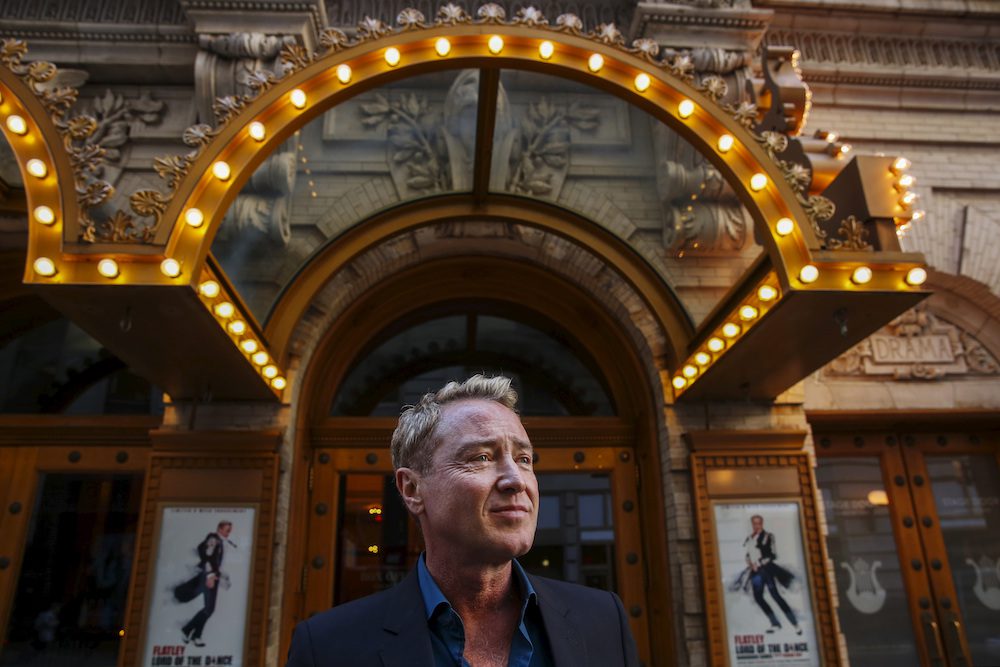 FILE PHOTO: Dancer Michael Flatley poses for a portrait in front of the Lyric Theater in New York November 17, 2015. REUTERS/Lucas Jackson