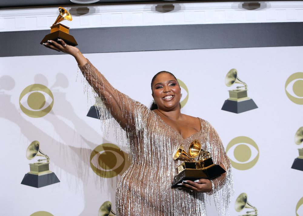 FILE PHOTO: Lizzo poses backstage with her Best Pop Solo Performance award at the 62nd Grammy Awards, Los Angeles, California, U.S., Jan. 26, 2020. REUTERS/Monica Almeida/File Photo
