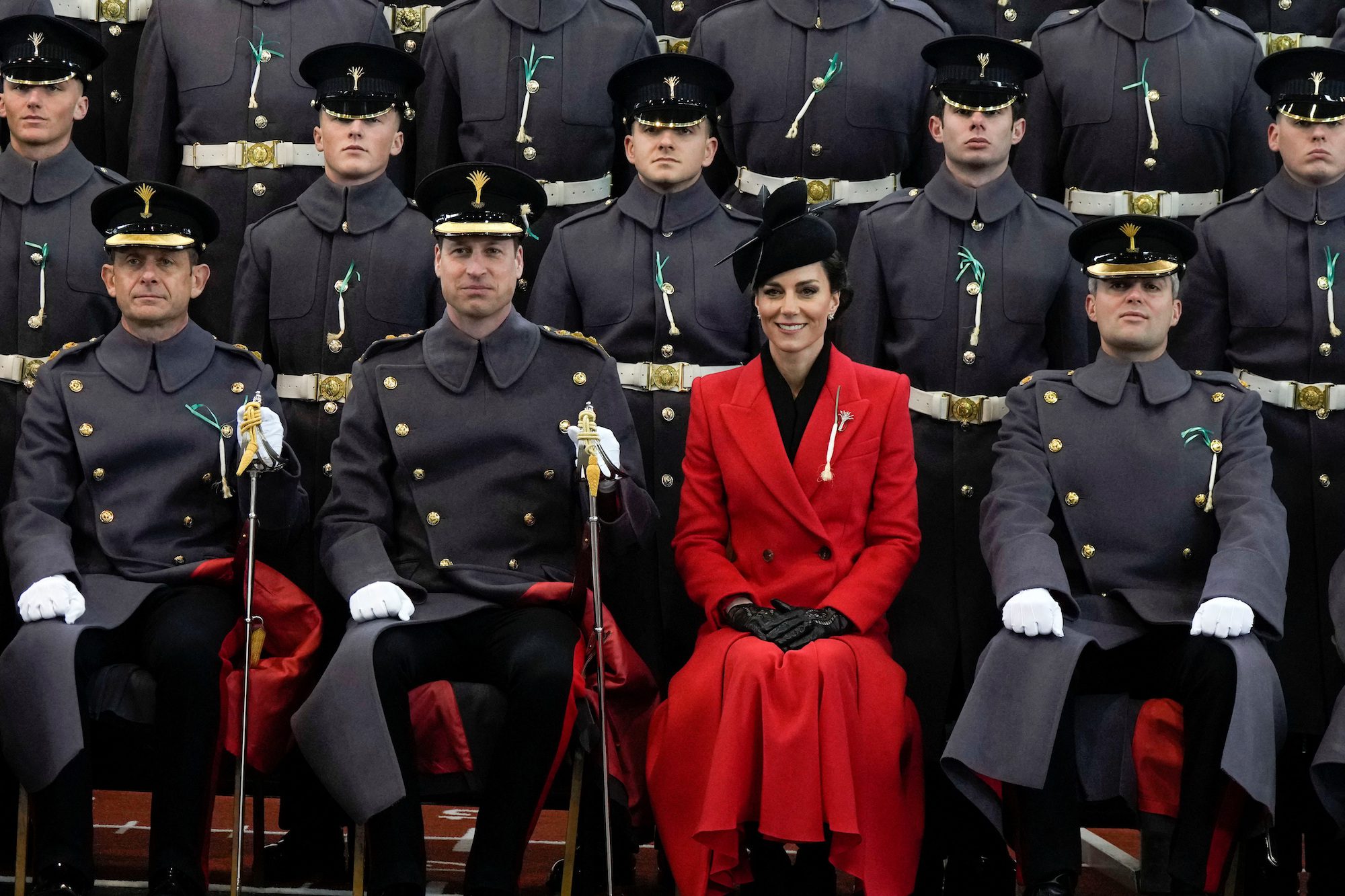 Britain's Prince William and Catherine, Princess of Wales sit for an official photo with The Prince of Wales's company at a St David's Day parade with members of the 1st Battalion, The Welsh Guards in Windsor, Britain, March 1, 2023. It is the first time The Prince has visited the Welsh Guards since becoming Colonel of the Regiment. Alastair Grant/Pool via REUTERS