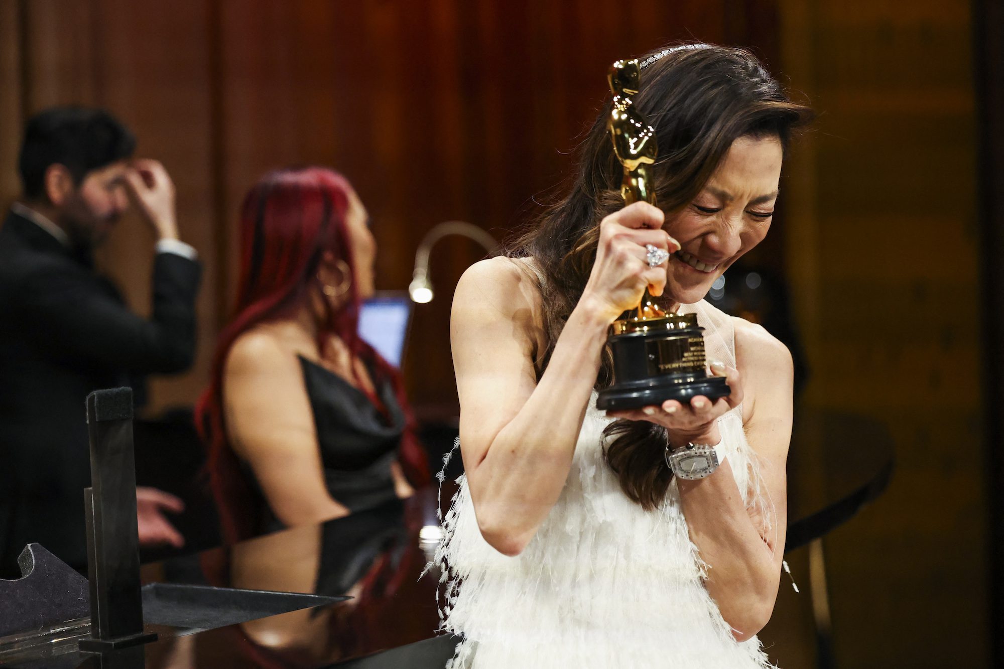 Best Actress Michelle Yeoh reacts after having her Oscar engraved at the Governors Ball following the Oscars show at the 95th Academy Awards in Hollywood, Los Angeles, California, U.S., March 12, 2023. REUTERS/Mario Anzuoni