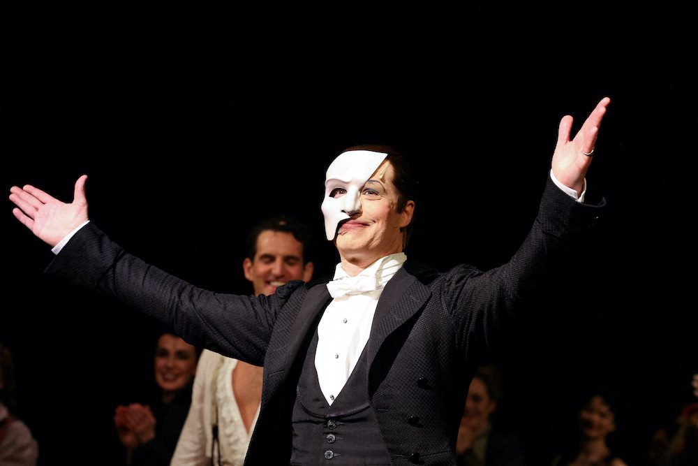 Laird Mackintosh, who substituted for Ben Crawford as the Phantom takes a bow after his final performance of the Phantom of the Opera, which closes after 35 years on Broadway, in New York City, U.S., April 16, 2023. REUTERS/Caitlin Ochs
