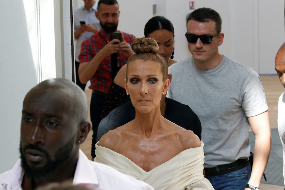 FILE PHOTO: Singer Celine Dion and Pepe Munoz arrive to attend the Haute Couture Fall/Winter 2019/20 collection show by designer Alexandre Vauthier in Paris, France, July 2, 2019. REUTERS/Regis Duvignau