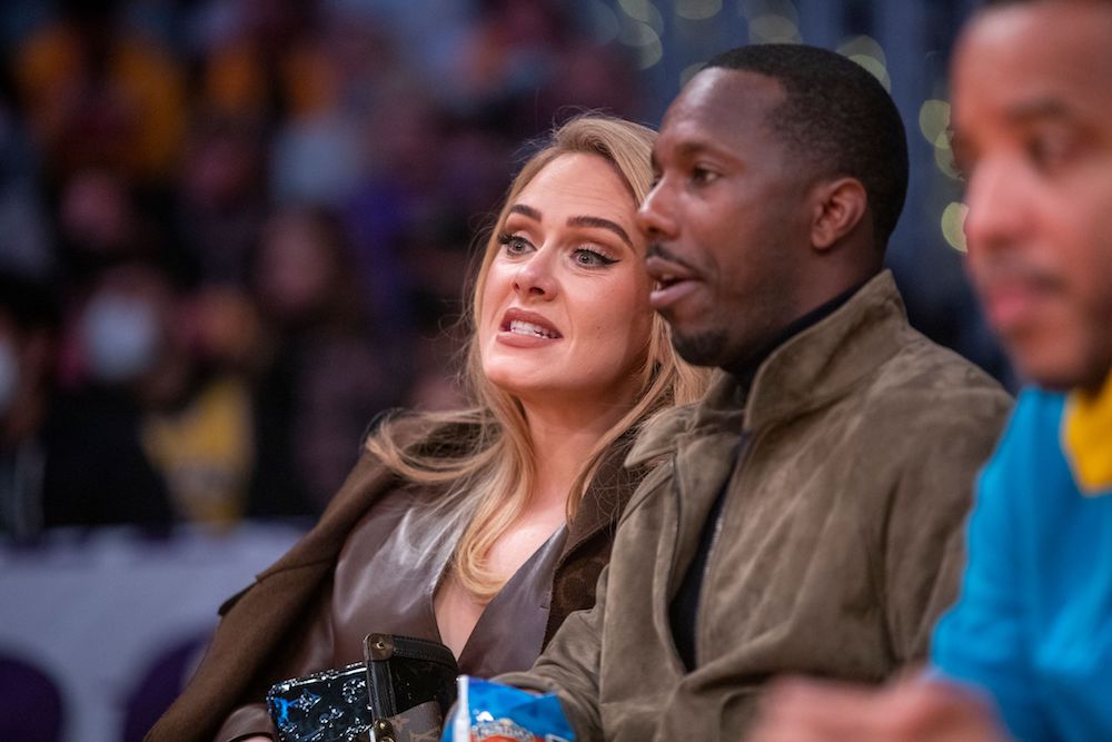 Singer Adele and sports agent Rich Paul attend a game between the Golden State Warriors and the Los Angeles Lakers on October 19, 2021 at STAPLES Center in Los Angeles. Photo by Allen J Schaben/Los Angeles Times/Shutterstock 