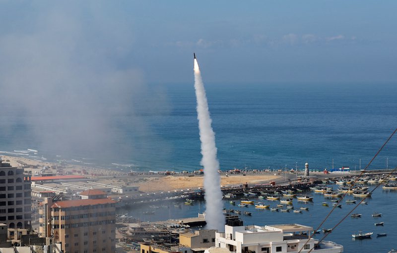 Rockets are fired by Palestinian militants into Israel, in Gaza City October 7, 2023. REUTERS/Mohammed Salem