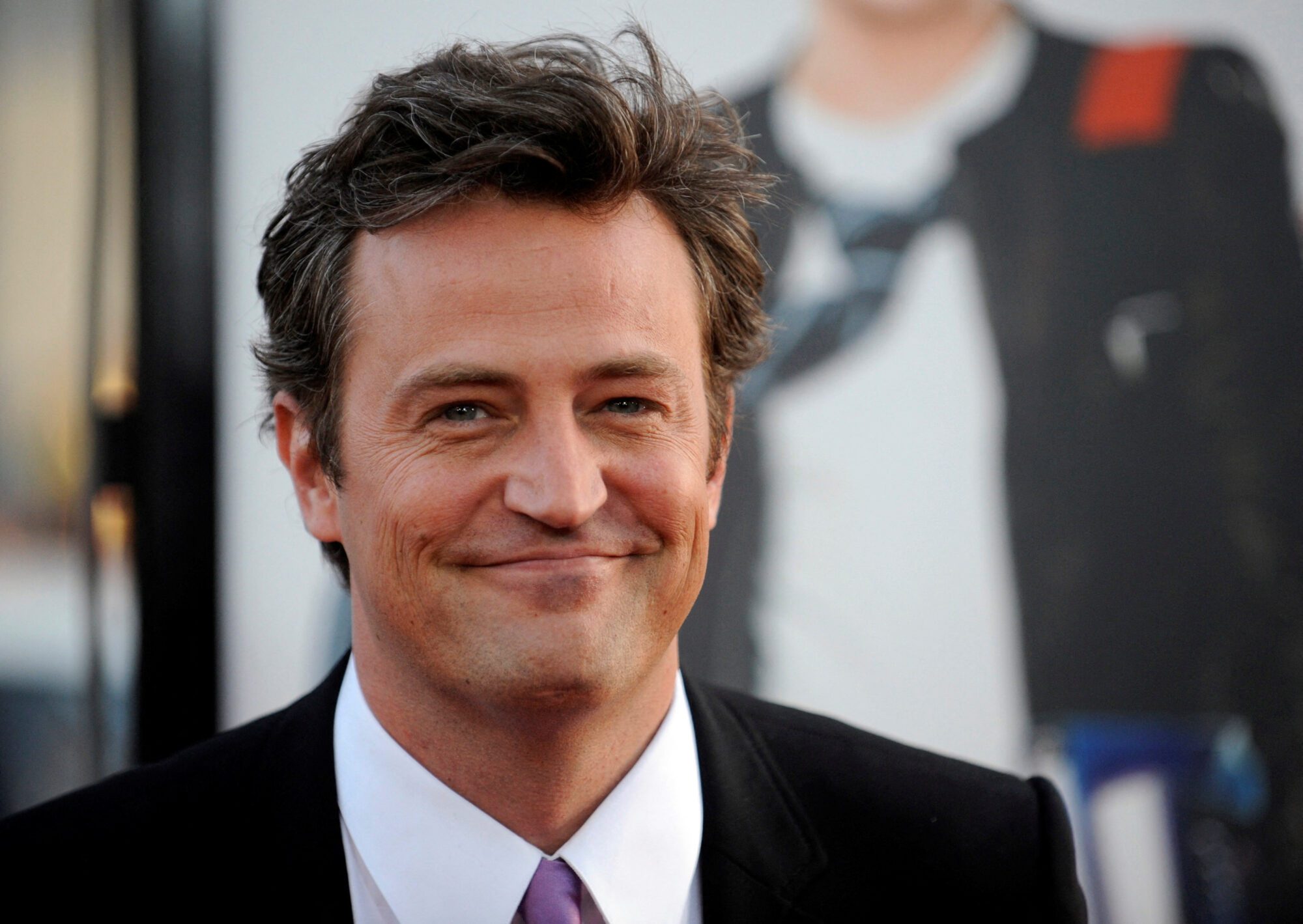 FILE PHOTO: Matthew Perry attends the premiere of the film "17 Again" in Los Angeles April 14, 2009. REUTERS/Phil McCarten/File Photo