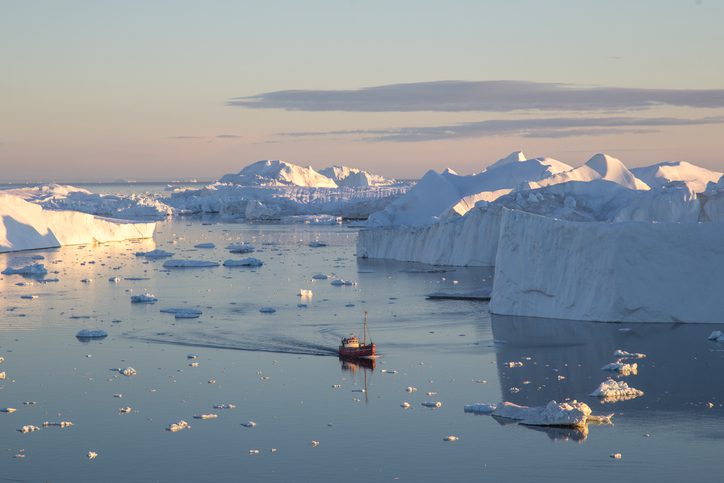 The icy expanse, and majestic icebergs in Ilulissat Icefjord, a UNESCO World Heritage site