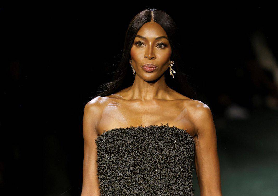 Naomi Campbell walks for Burberry