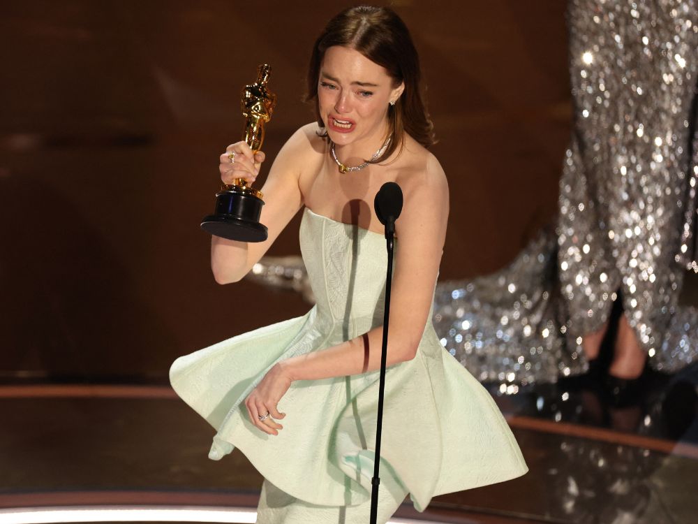 Emma Stone accepts the Oscar for Best Actress for "Poor Things" during the Oscars show at the 96th Academy Awards in Hollywood, Los Angeles, California, U.S., March 10, 2024. REUTERS/Mike Blake