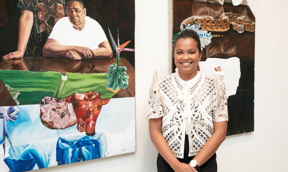 La Prairie Art Award 2024 recipient Marikit Santiago with her artworks 'A Seat at the Table (Magulang)' 2022 (left) and 'A Seat at the Table (Kapatid)' 2022, Art Gallery of New South Wales, La Prairie Art Award 2024 © Marikit Santiago, photo © Art Gallery of New South Wales, Penny Clay