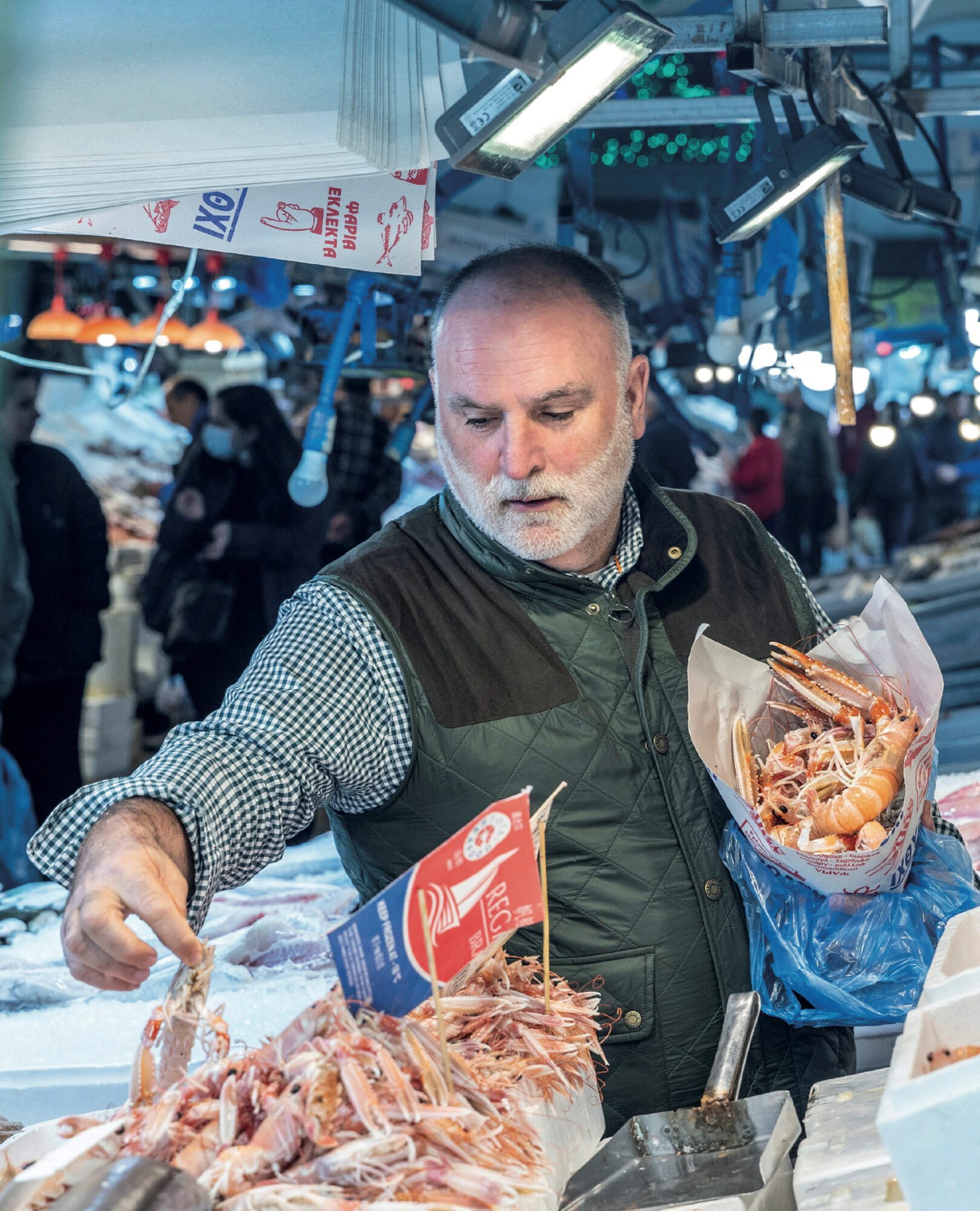 Chef Jose Andres shops at the Athens Central Market in Athens, Greece, in this undated handout image.  Thomas Schauer/Handout via REUTERS