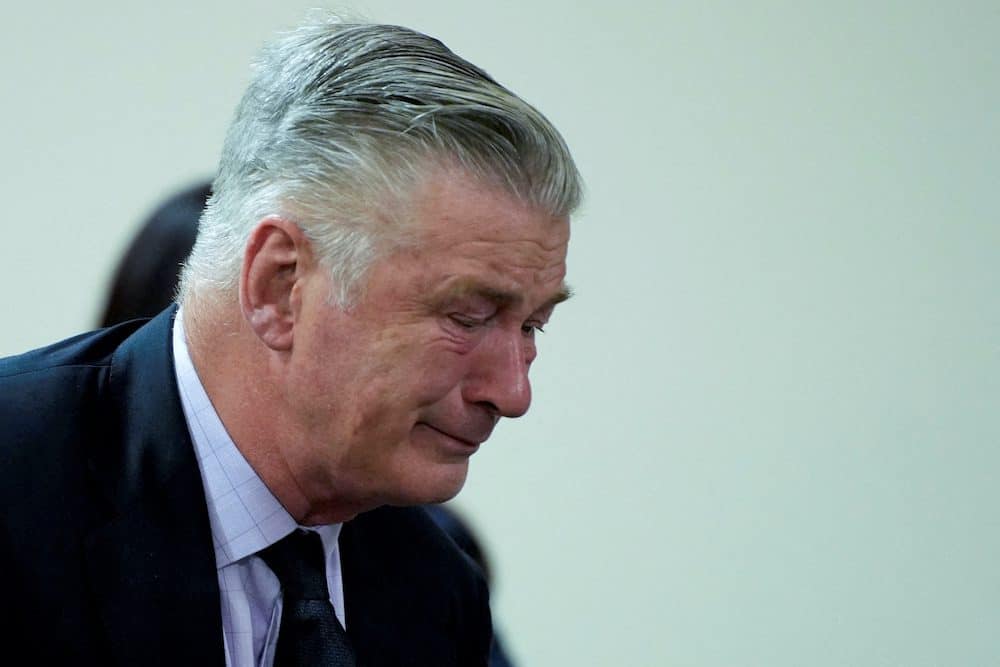 Actor Alec Baldwin reacts during his trial on involuntary manslaughter at Santa Fe County District Court in Santa Fe, New Mexico, on July 12, 2024. In October 2021, on the New Mexico set of the Western movie "Rust," a gun pointed by Baldwin discharged a live round, killing the film's cinematographer Halyna Hutchins and wounding its director.     RAMSAY DE GIVE/Pool via REUTERS