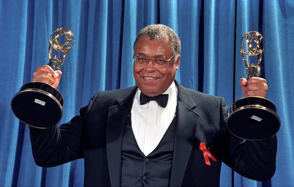 FILE PHOTO: James Earl Jones holds up the two Emmy Awards he won won for Outstanding Lead Actor in a Drama Series for "Gabriel's Fire", and Outstanding Supporting Actor in a Mini-Series or Special for the TNT movie "Heat Wave" in Los Angeles, 1991. REUTERS/Mircovich/File Photo