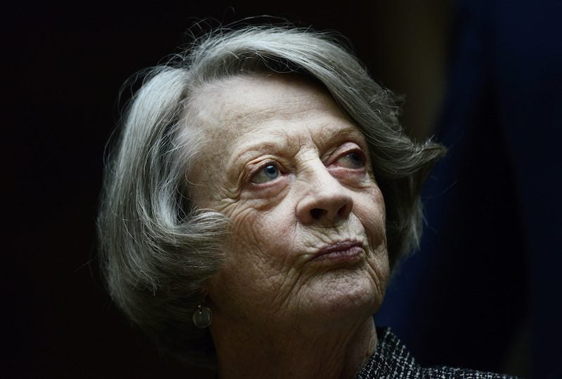 FILE PHOTO: Downton Abbey cast member Maggie Smith poses for the media at a hotel in central London, Britain August 13, 2015. Downton Abbey's final season is due to premiere in September.  REUTERS/Dylan Martinez/File Photo