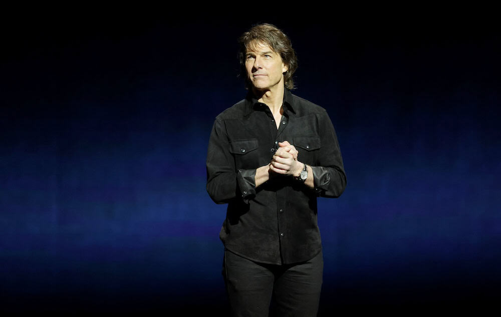 FILE PHOTO: Actor Tom Cruise, promoting the film “Mission: Impossible - The Final Reckoning” stands onstage during a Paramount Pictures presentation at CinemaCon, the official convention of Cinema United, in Las Vegas, Nevada, U.S. April 3, 2025. REUTERS/Steve Marcus/File Photo