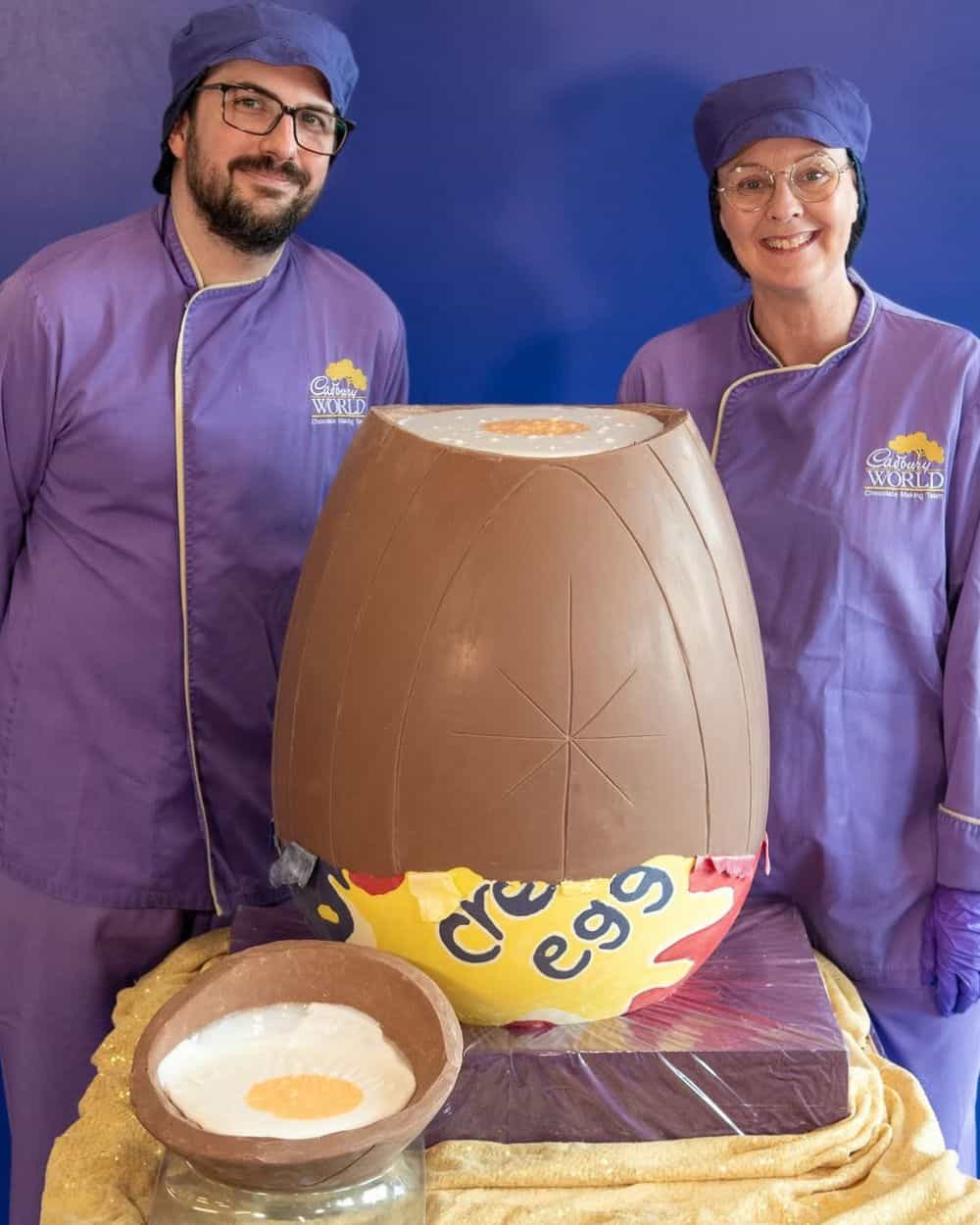Cadbury chocolatiers Terry Collins and Dawn Jenks created the giant Creme Egg. Image / @Cadburyworlduk

