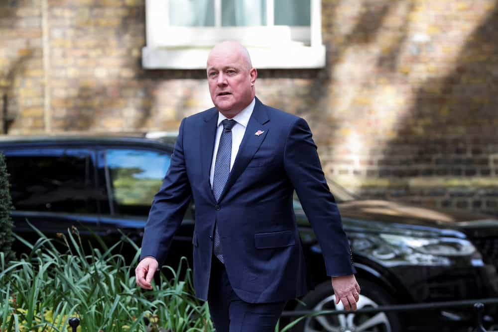 FILE PHOTO: New Zealand's Prime Minister Christopher Luxon walks at Downing Street to meet Britain's Prime Minister Keir Starmer, in London, Britain, April 22, 2025. REUTERS/Belinda Jiao/File Photo