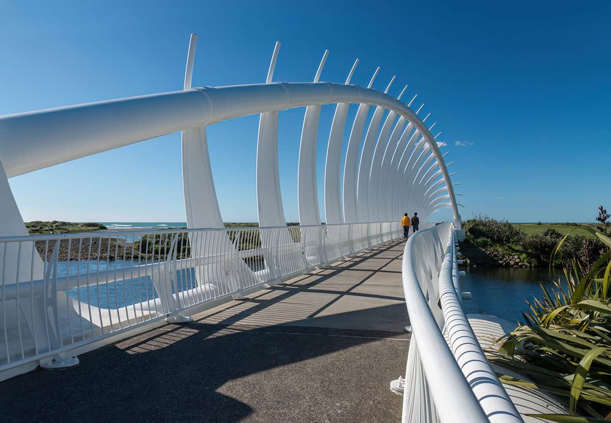 People walking on Te Rewa Rewa bridge. New Plymouth