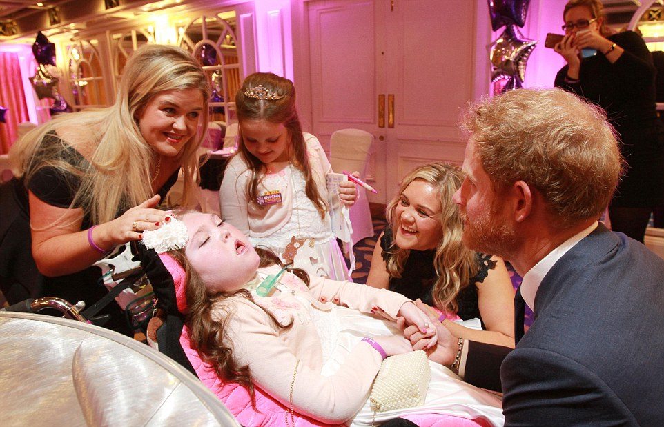 WellChild Awards 2015 sponsored by GSK at The Hiloton Park Lane, London - Most Caring Young Person Award Winner Ruby Smallman and her sister Holly Smallman  Prince Harry after Ruby presented Prince Harry with a  penguin she made for the Prince - 5.10.2015 Picture by Antony Thompson - Thousand Word Media, NO SALES, NO SYNDICATION. Contact for more information mob: 07775556610 web: www.thousandwordmedia.com email: antony@thousandwordmedia.com The photographic copyright (© 2015) is exclusively retained by the works creator at all times and sales, syndication or offering the work for future publication to a third party without the photographer's knowledge or agreement is in breach of the Copyright Designs and Patents Act 1988, (Part 1, Section 4, 2b). Please contact the photographer should you have any questions with regard to the use of the attached work and any rights involved.