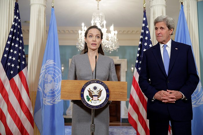 Angelina Jolie speaks about the plight of refugees as U.S. Secretary of State John Kerry listens on World Refugee Day at the State Department in Washington, U.S., June 20, 2016. REUTERS/Joshua Roberts