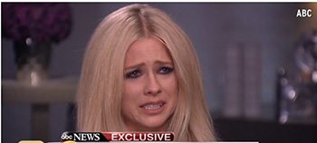 Tearful Avril Lavigne says she has Lyme Disease; Australia still denies it exists.