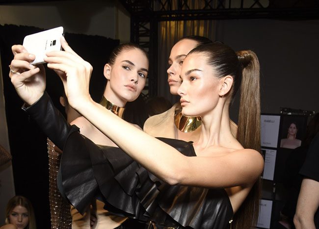 Models backstage at Balmain