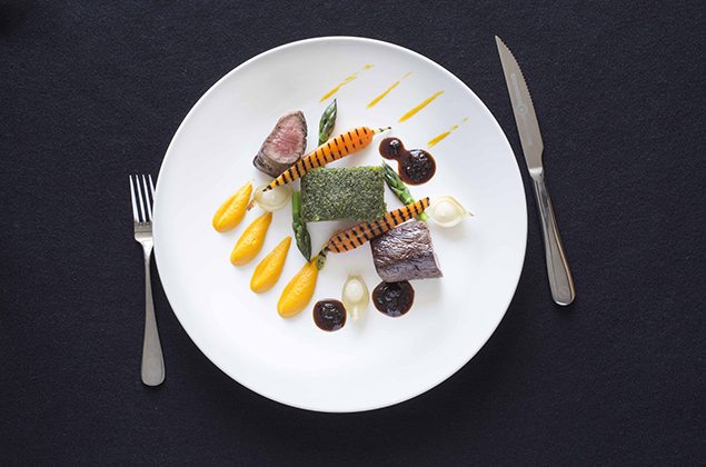 Silver Fern Farms Reserve beef eye fillet with a parsley, mustard and horseradish crust, carrot puree, asparagus, whipped garlic and a cep jus. 