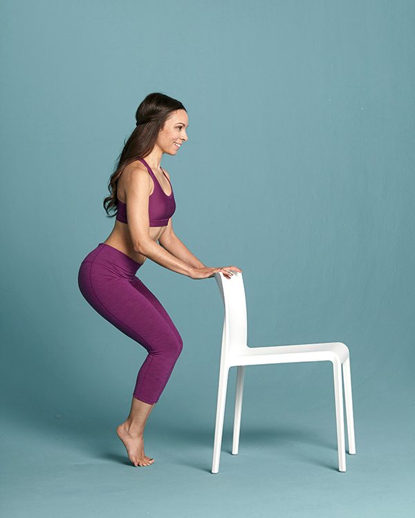 High Heels - starting position. TIP: For this squat lower hips as far down as you can, squeezing your inner thighs together. With your heels raised, hold core muscles in to help you balance.