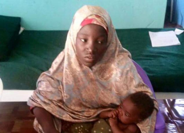Undated picture released May 18, 2016 by Nigeria army of rescued Chibok schoolgirl and her baby in Maiduguri, Nigeria.  REUTERS.