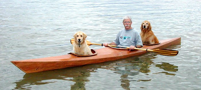 Man takes dogs on adventures in custom kayak
