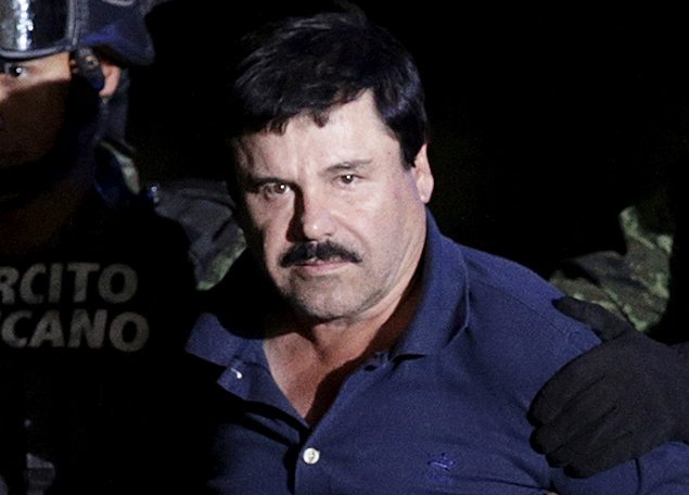 Recaptured drug lord Joaquin "El Chapo" Guzman is escorted by soldiers REUTERS/Henry Romero.