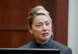 Actor Amber Heard testifies in the courtroom at the Fairfax County Circuit Courthouse in Fairfax, Va., Monday, May 16, 2022.  Steve Helber/Pool via REUTERS