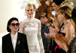 FILE PHOTO: Models applaud Japanese designer Hanae Mori (L) at the end of her Haute Couture 2003-2004 Autumn-Winter collection in Paris, July 9, 2003.
