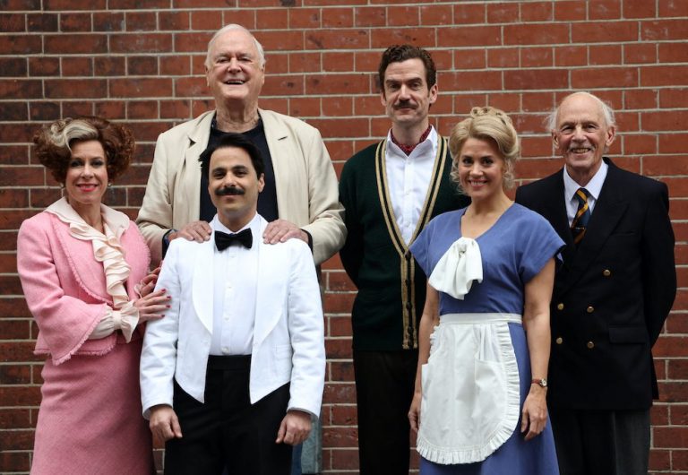 British actor John Cleese poses with cast members from the play Fawlty Towers at the Apollo Theatre in London, Britain, May 2, 2024. From left are: Anna-Jane Casey (Sybil), Hemi Yeroham (Manuel), Adam Jackson-Smith (Basil), Victoria Fox (Polly) and Paul Nicholas (The Major). REUTERS/Suzanne Plunkett