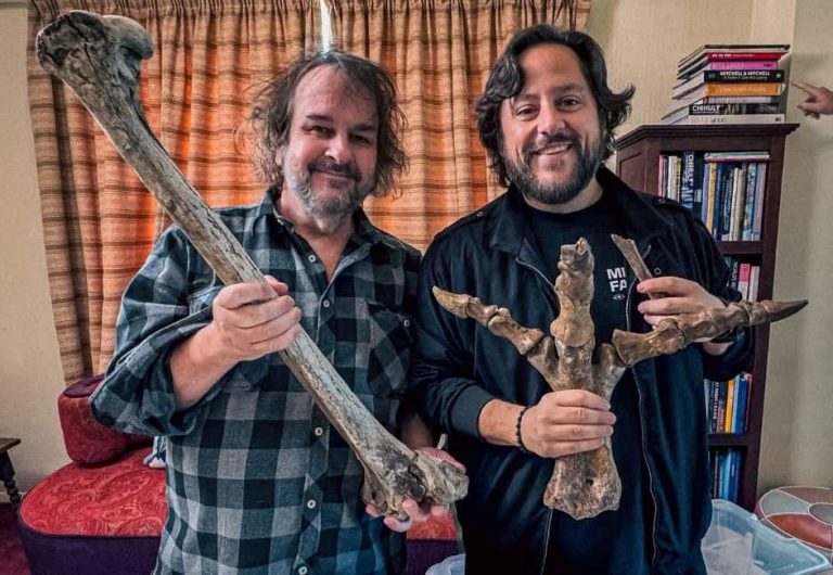 Sir Peter Jackson and Ben Lamm (CEO and Co-Founder of Colossal Biosciences) holding South Island Giant Moa bones. Photo / Colossal Biosciences