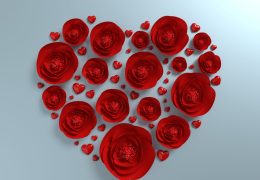 Red Roses are Creating Heart Shape On Blue Background