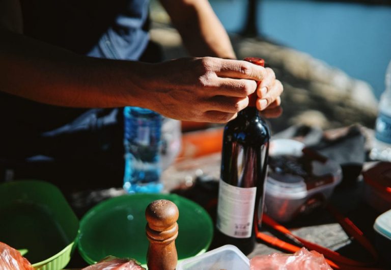 Bottle of wine on picnic table