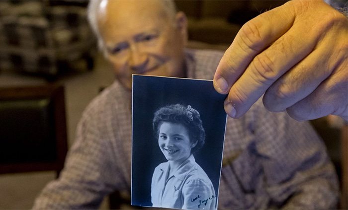Norwood Thomas with a photo of Joyce Morris at his home in Virginia Beach. Photograph: Bill Tiernan/AP