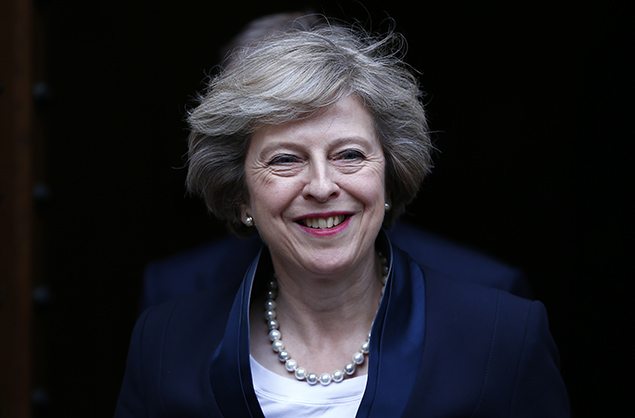 Theresa May emerges to speak to reporters after being confirmed as the leader of the Conservative Party and Britain's next Prime Minister outside the Houses of Parliament in Westminster, central London. REUTERS/Neil Hall.