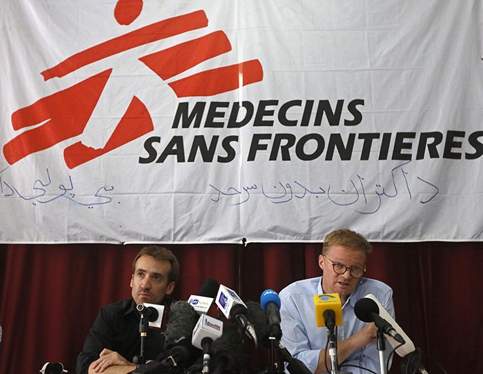 Christopher Stokes (R), general director of Medecins Sans Frontieres (MSF), and Guilhem Molinie, the group's country director for Afghanistan, attend a news conference in Kabul, Afghanistan October 8, 2015. 