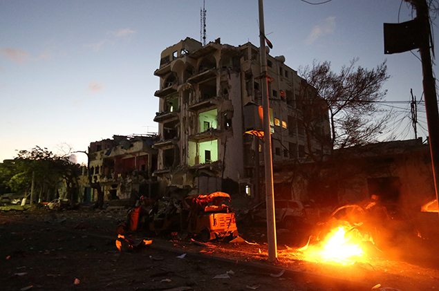 A vehicle burns at the scene of a suicide car bombing outside Hotel Ambassador on Maka Al Mukaram Road in Somalia's capital Mogadishu, June 1, 2016. REUTERS/Feisal Omar