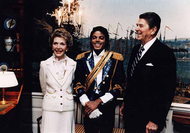 File photo showing former President Ronald Reagan and first lady Nancy Reagan posing with entertainer Michael Jackson in May of 1984. 