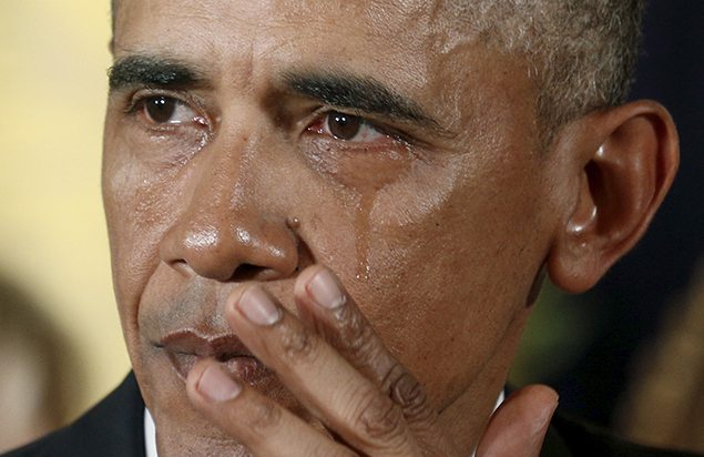 U.S. President Barack Obama wipes a tear while talking about the Sandy Hook massacre and other mass killings during an event held to announce new gun control measures at the White House.
REUTERS/Kevin Lamarque