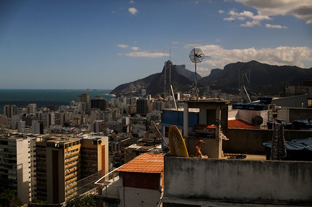 Dois Irmaos (Two brothers) peaks are seen from the Tiki hostel in Cantagalo favela, in Rio de Janeiro. REUTERS/Pilar Olivares     