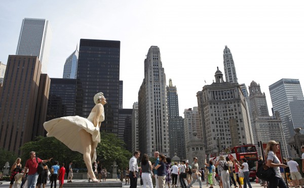 The sculpture ‘Forever Marilyn’ by artist Seward Johnson is seen against the Chicago skyline in 2011. REUTERS/Jim Young