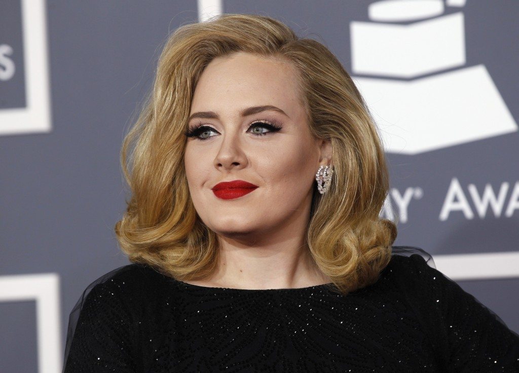 British singer Adele arrives at the 54th annual Grammy Awards in Los Angeles